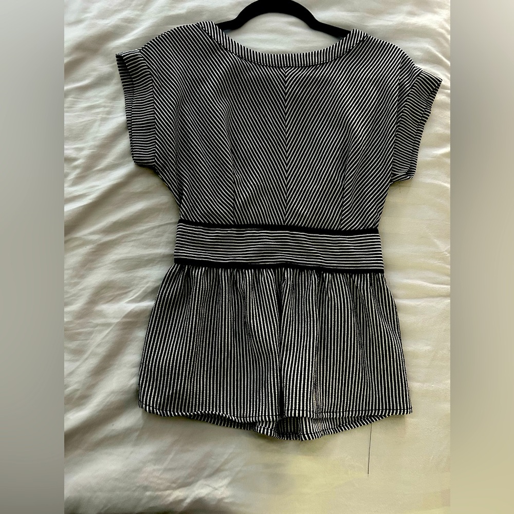 Classic striped blouse a versatile fit—ideal for casual or business chic styles!